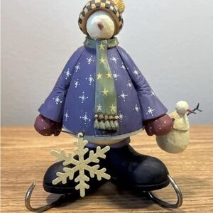 NIB WilliRaye Our First Skate Snowman Figurine with Purple Coat and Snowflake.
